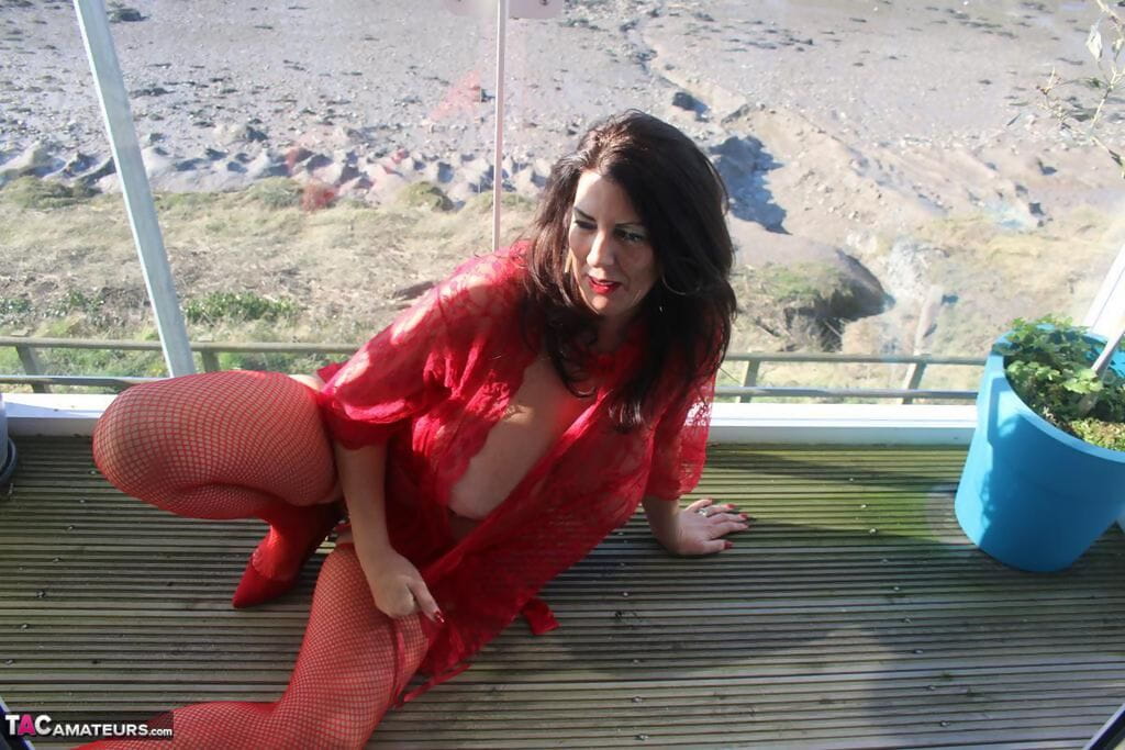 Brunette plumper Lu Lu Lush uncorks her giant tits in all red lingerie page 1