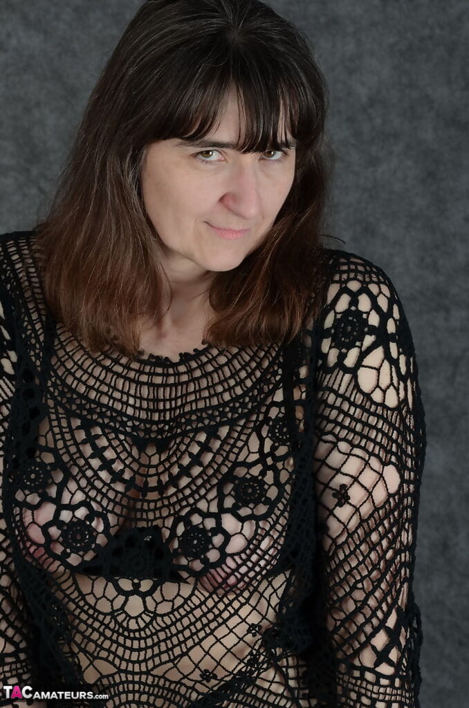 Mature mom in sheer lace dress exposes her floppy boobs & hairy armpits page 1