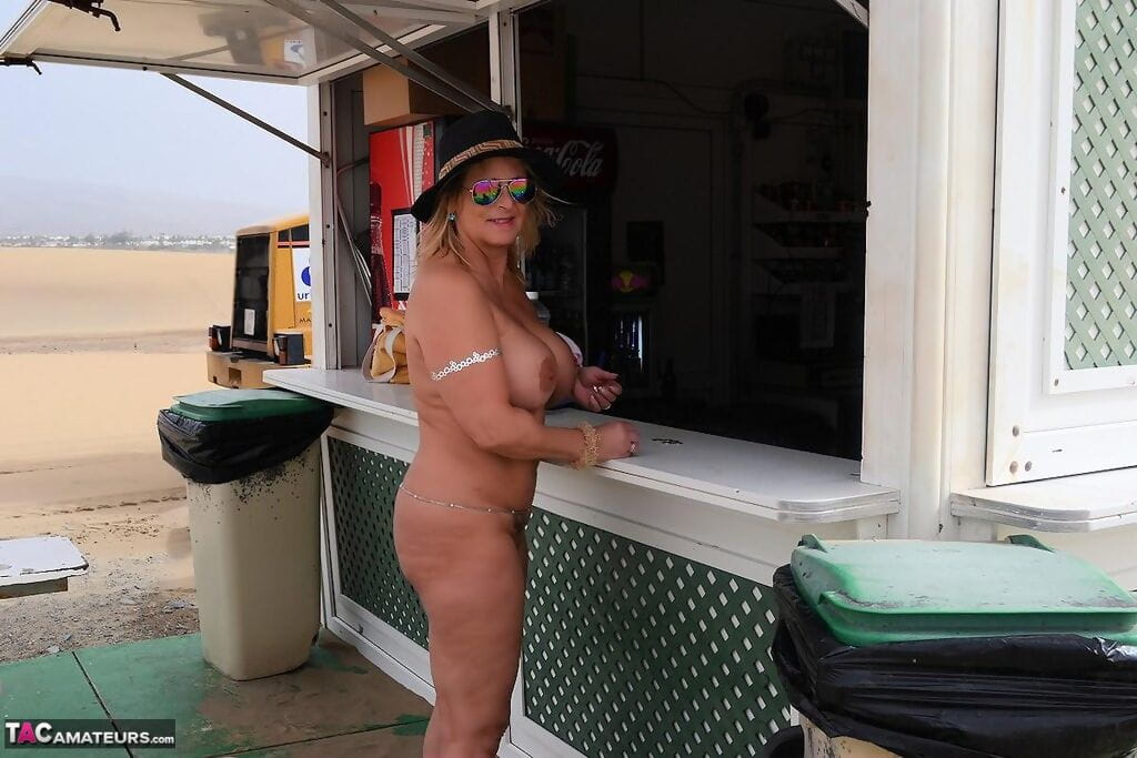 Amateur BBW Nude Chrissy wanders along a beach with no clothes on page 1